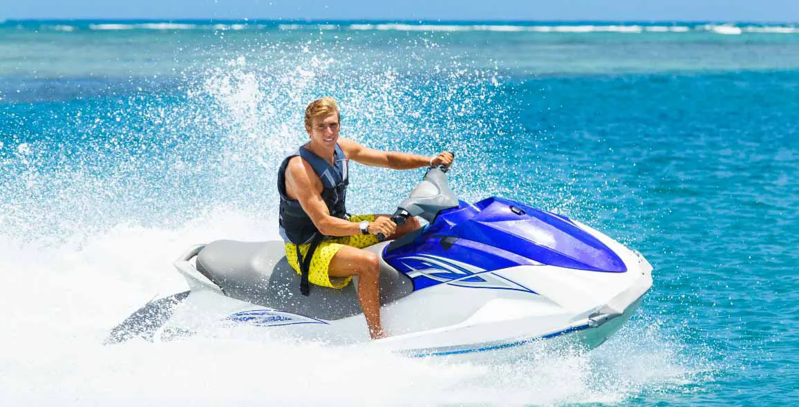 Boy enjoying thrilling Yamaha Waverunners 1100cc jet ski in Dubai